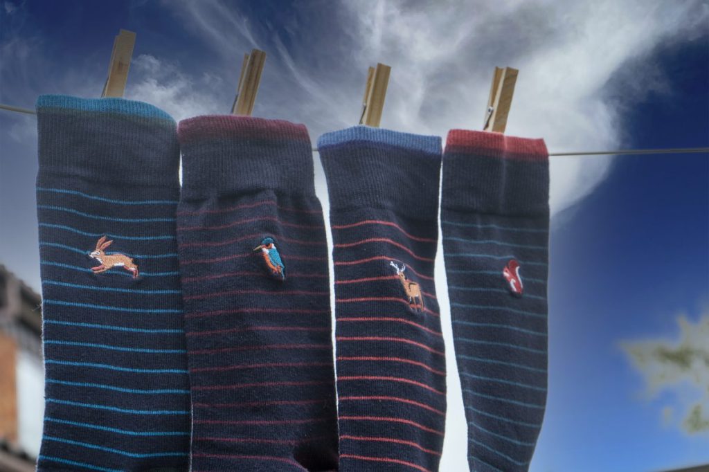Feet and Footwear image of socks on a washing line by Dave Hook