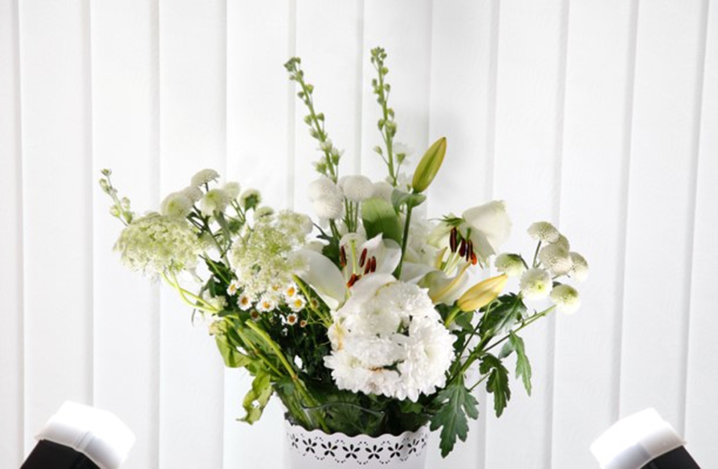 Image of white flowers in a vase for week 20 example